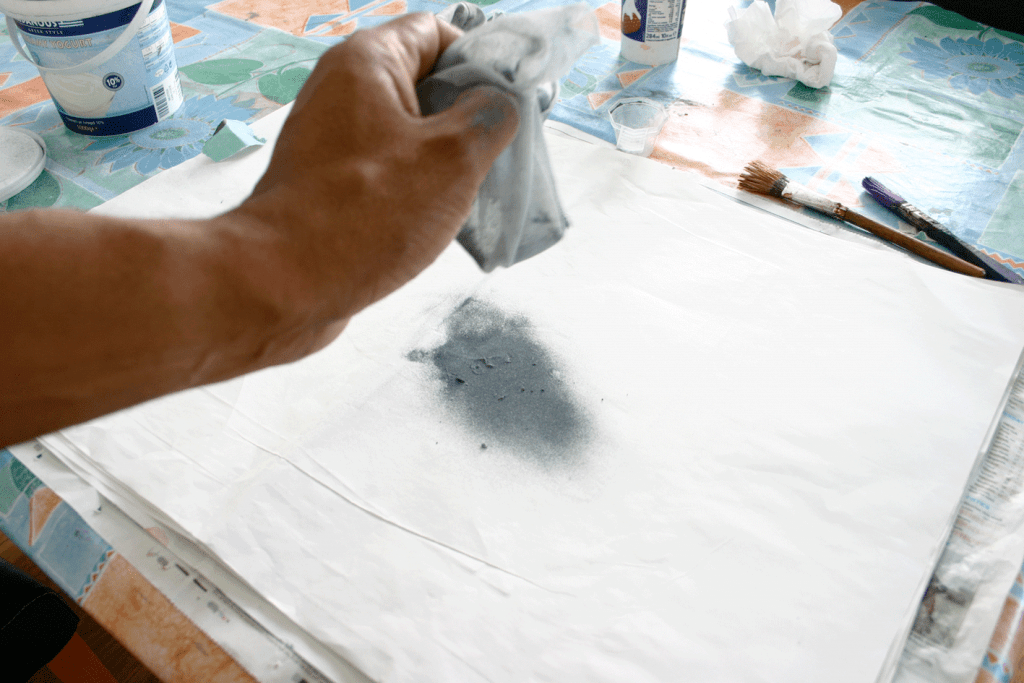 Dusting carborundum powder