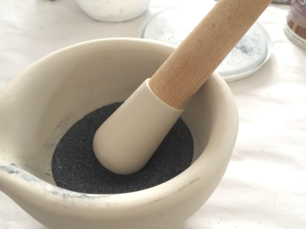 A plate for 'The Fourteen'?: mortar and pestle to grind carborundum powder