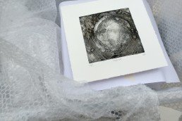 Framed and ready?! One of the small images being prepared for transportation to storage